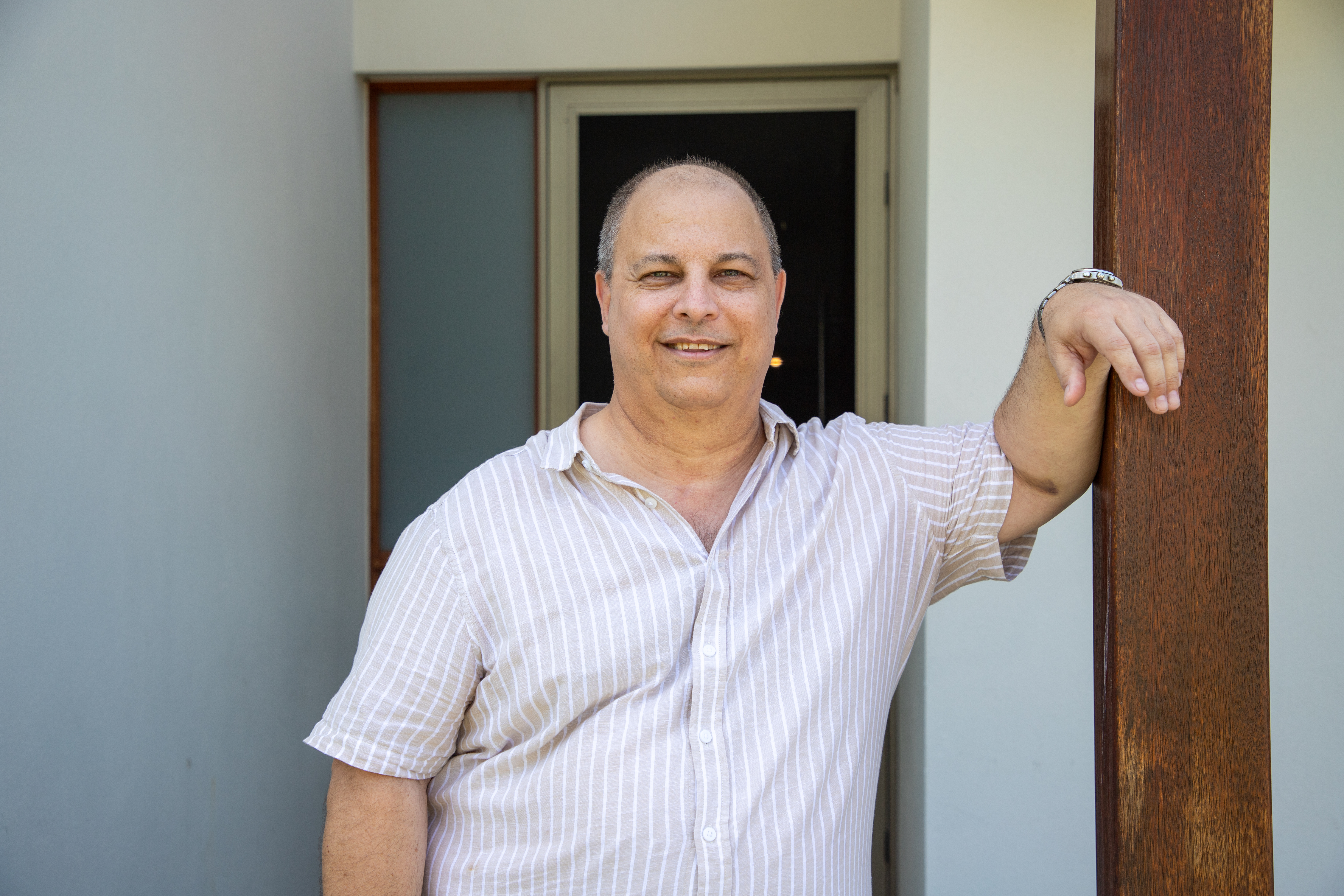 Steve from Gold Coast, standing in front doorway